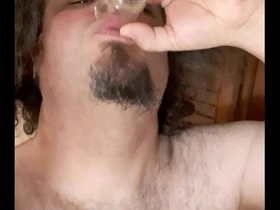 Drinking my own cum from a shot glass