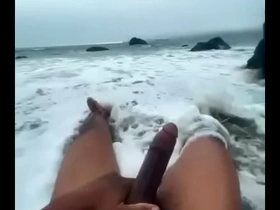 Blacmartian stroking bare ass on nude beach