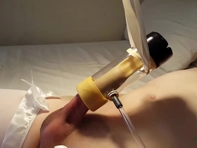 Adorable teen femboy is gently milked by milking machine and cums deep inside venus milking receiver while wearing sexy white thighhigh stockings