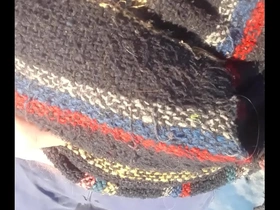 Naked driver pisses his light sweat pants while walking barefoot in snow