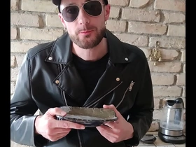 Leather guy cums on a plate