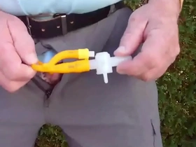 Catheter empties bladder at golf course by pinky 396