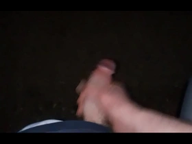 Jerking off my cock and shooting cum on the side of the road