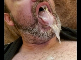 Cumlord blowing bubbles with a mouthful of goo